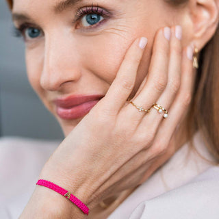BRACCIALE TESSUTO ROSA CON LETTERA - ORO18KT - Shine gioielli